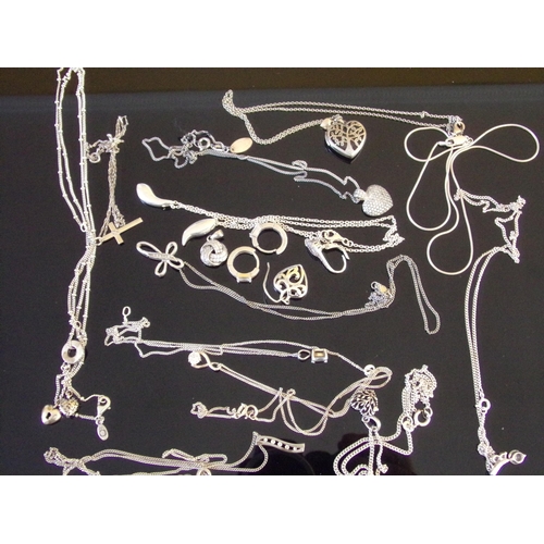 73 - Good selection of silver chains and pendants 55.8g approx.