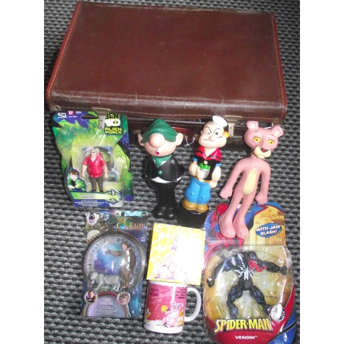 103 - Small  vintage suitcase 18x11 with collection of assorted vintage and mc Donald toys mostly unopene... 