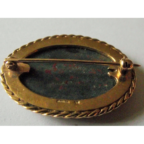 52 - Lovely quality vintage multi coloured hardstone oval shape brooch set in a 9ct gold frame. Fully mar... 