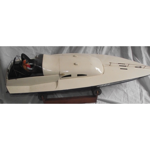 32 - Surfey  fibre glass model speed Boat made in 1956  approx 37 long  powered by a 12volt industrial m... 