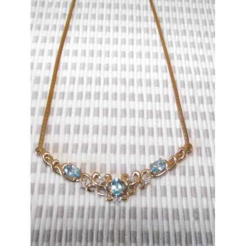 54 - Quality ladies 9ct Gold  necklace set with diamonds & aquamarine fully marked 16 approx. 7.2g appro... 