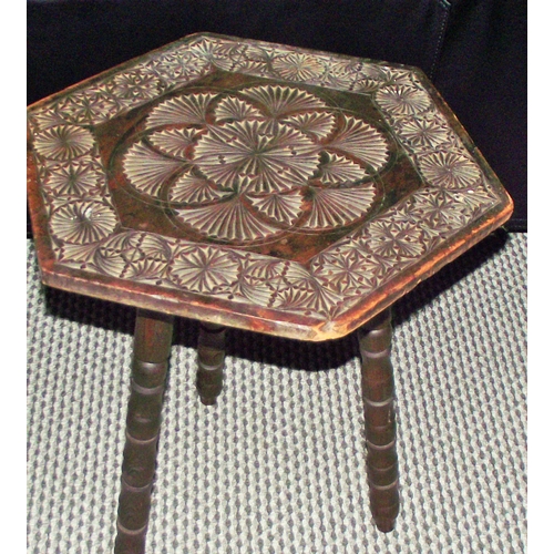 102 - Vintage indian style chip carved top side table raised on 3 turned legs 19