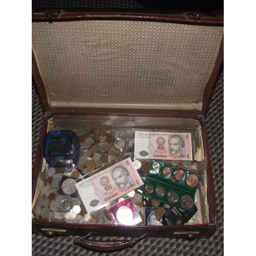 105 - Small vintage suitcase partially full of various coins from uk and around the world