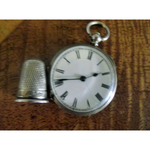 46 - Ladies silver key wind pocket 35mm diameter watch marked fine silver (start -stops)+ hallmarked silv... 