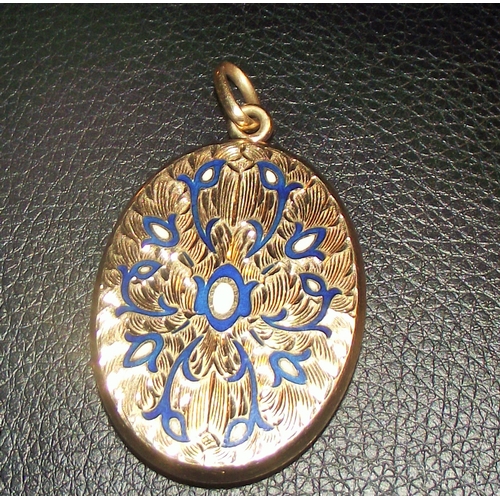 65 - Locket marked internally 14k with enamel  decorated front  4x3cm approx 16.9g approx