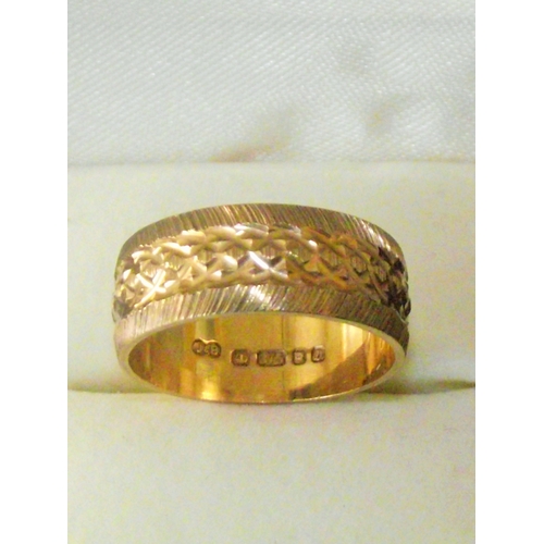 73 - Ladies 9ct gold  band diamond cut design 3.8g approx  size M