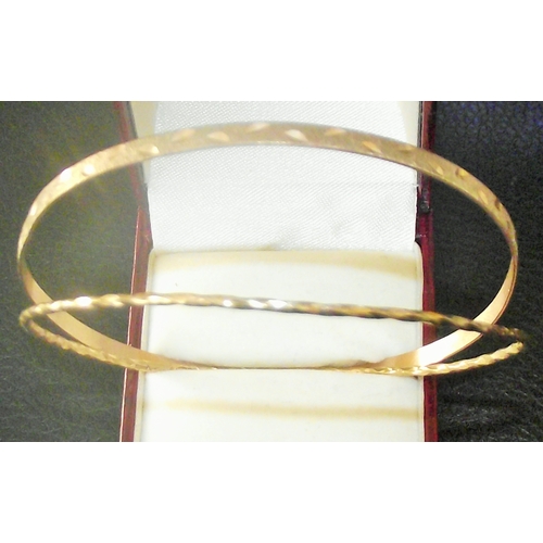 78 - 2x ladies 9ct gold bangles 7cm diameter  6g approx