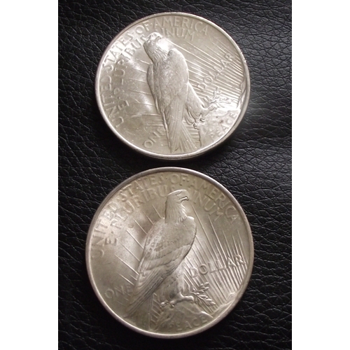 57 - 2x Rare 1922 silver Liberty one dollar coins both in good condition