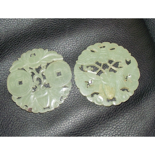 36 - 2x circular 19thc jade pendants/plaques both with intricate design and pierced work 6cm diam