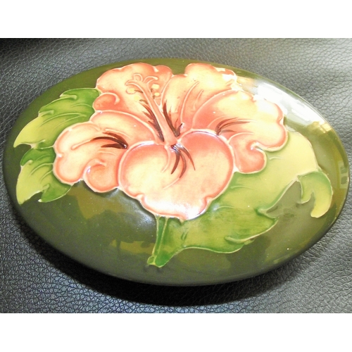 72 - Moorcroft green ground hibiscus pattern lidded shallow dish , impressed moorcroft mark to base