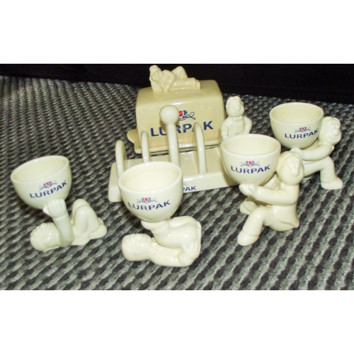 97 - Set of vintage Lurpak collectibles , egg cups , butter dish , toast rack