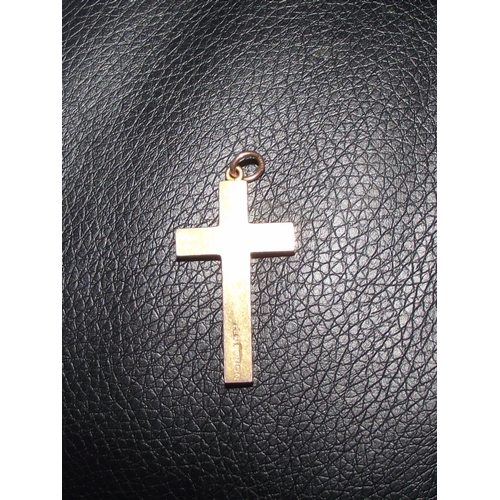 35 - Fully marked solid 9ct gold cross 2.99g approx