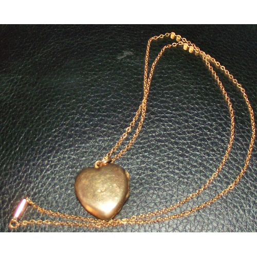 45 - Heart locket marked 9ct front& back on 9ct gold chain 3.5g approx