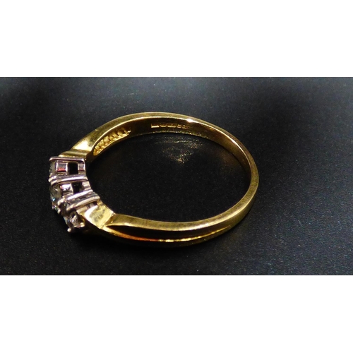 81 - Gold 18ct Ring with 3 Central Diamonds (approx total 0.75 carat) with Presentation Box