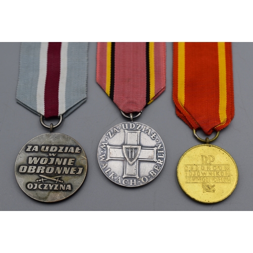 90 - Three Medal's all complete with Ribbons including Polish Defence of Warsaw, Medal for Warsaw 1939 -1... 