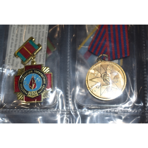 99 - Selection of 18 Soviet Union Medal's including Medal for Gallantry, Defence of the Caucasus, Capture... 