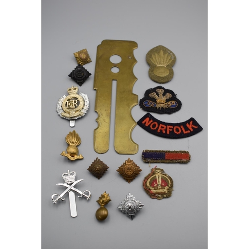 103 - Mixed badges and military items