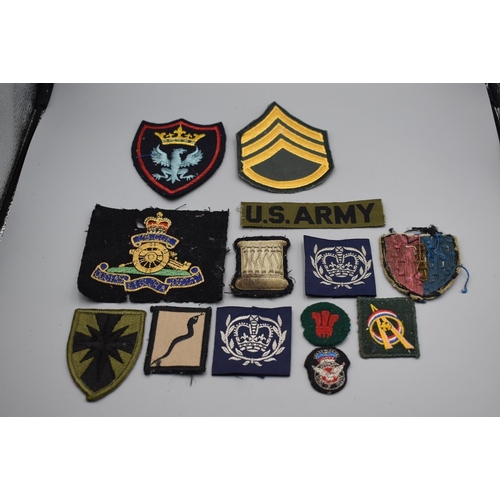 114 - Mixed lot of military cloth badges