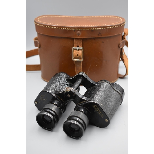 123 - WWII British Military binoculars by Taylor Hobson dated 1943 with a brown leather case. Optics good