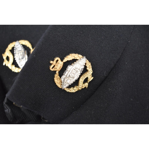 128 - Vintage officers uniform matching tunic and trousers. Sleeve, collar badges and buttons for the Roya... 