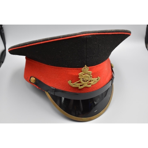 62 - Red and Black army cap with Kings Crown Royal artillery badge and buttons