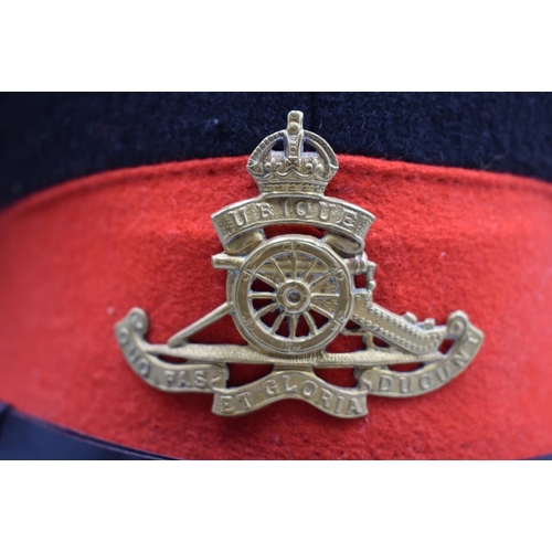 62 - Red and Black army cap with Kings Crown Royal artillery badge and buttons