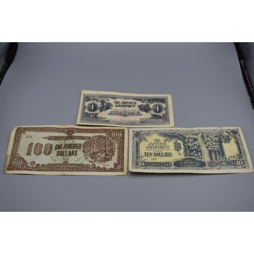 74 - Three WWII Japanese government banknotes. 100, 10 and 1 dollars