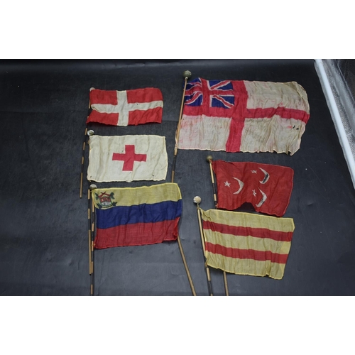 78 - Six different old small silk flags including Royal Navy, Red Cross, Turkey and 3 Unidentified