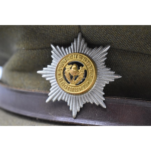 89 - WWII British Officers Khaki service cap with a Cheshire regiment badge