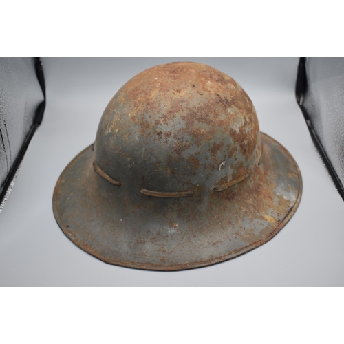 90 - WWII Home Front Zuckerman steel helmet with liner. Marked SFP on the Front dated 1941