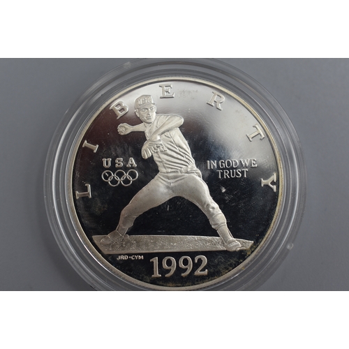 61 - USA Liberty Silver 900 XXV Olympiad Coin