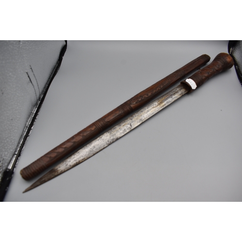 116 - Swagger Stick with a Concealed Blade, and tooled leather outer covering