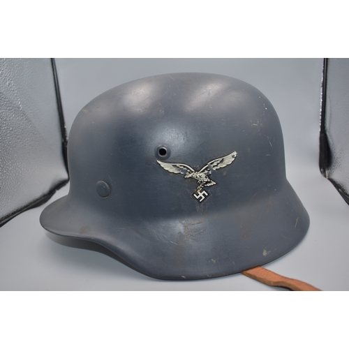 212 - WWII double decal German Luffwaffe Steel Helmet with Liner and Chinstrap. Shell marked Q64 and 1880,... 