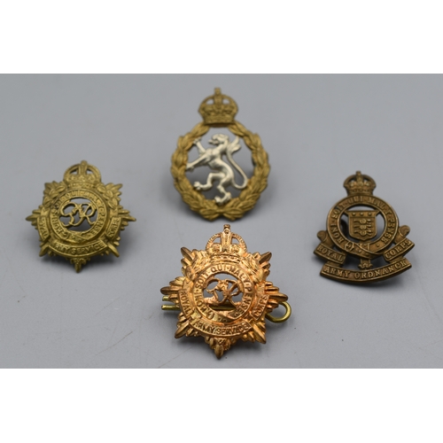 110 - Four WWII British Army Collar Badges