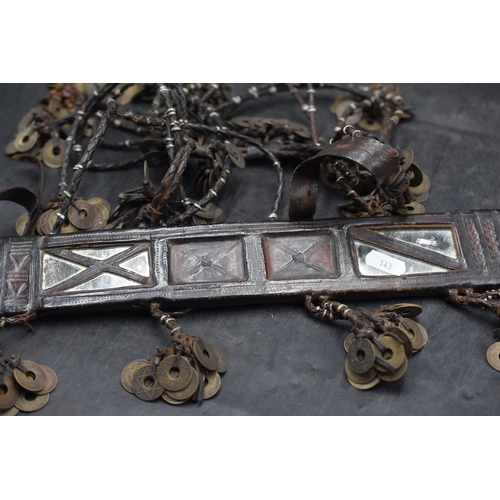 143 - Vintage African Sword. The Mirror Panelled Scabbard is Decorated with over a Hundred Coins on Leathe... 