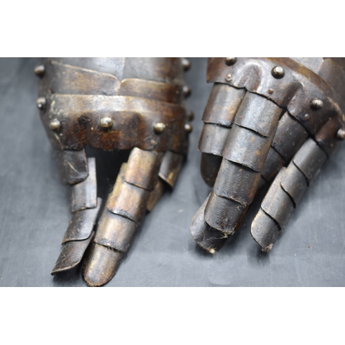 148 - Pair of Gauntlets from a Suit of Armour