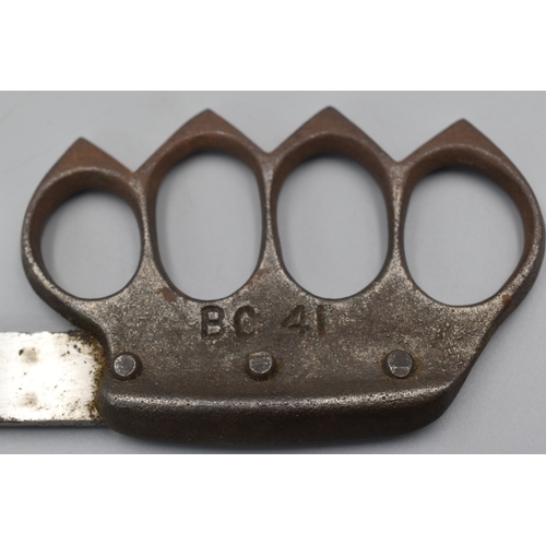 184 - A Second World War BC 41 Commando Knuckleduster Knife, with 13.5cm single edge hatchet tip steel bla... 