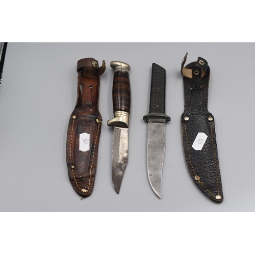 125 - Two Vintage Sheath Knives complete with Leather Sheath