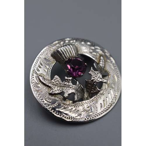 57 - Hallmarked Silver Amethyst Stoned Thistle Brooch