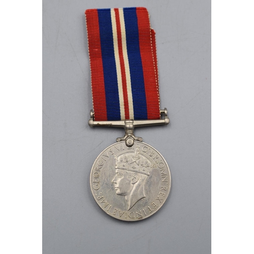 108 - WWII British War Medal with Ribbon. Full Size