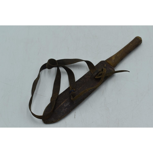 132 - African Knife. Blade marked RADES. Leather Sheath with a Leather Shoulder Strap. 30cm Long