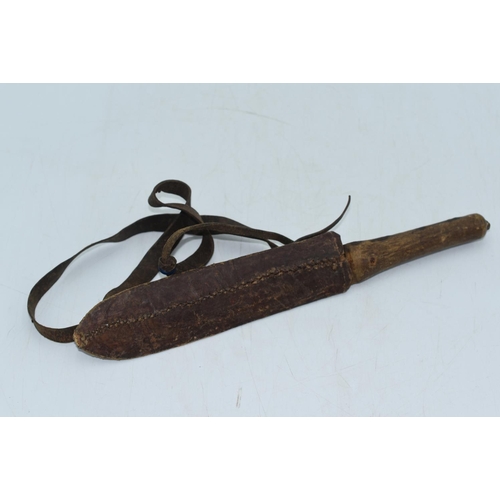 132 - African Knife. Blade marked RADES. Leather Sheath with a Leather Shoulder Strap. 30cm Long