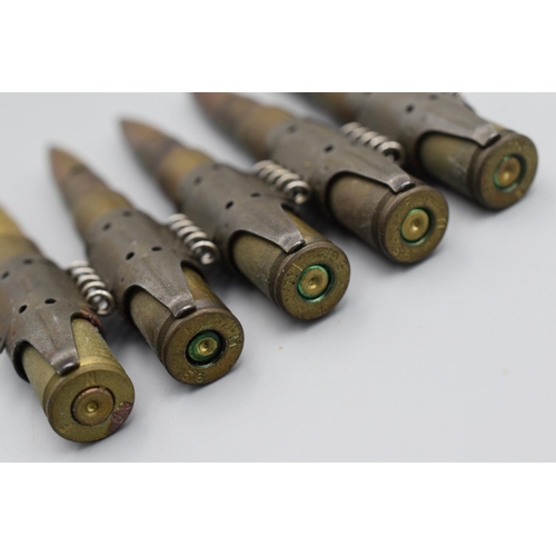 265 - Five Inert Machine Gun Bullets on Ammunition Belt