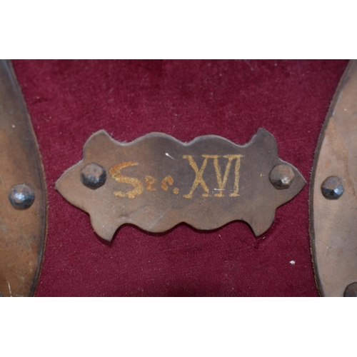 107 - Vintage sword with brass hilt. Etched decoration on the blade. Mounted on a leather and velvet cover... 