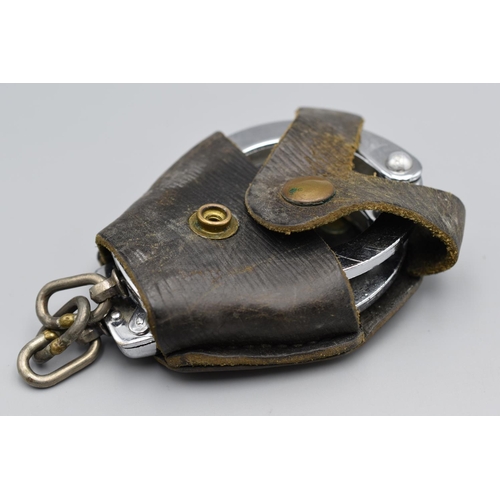 113 - Pair of steel handcuffs in a leather case