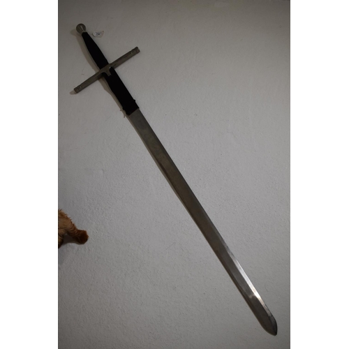 114 - Very large double handed steel sword. 137 cm long