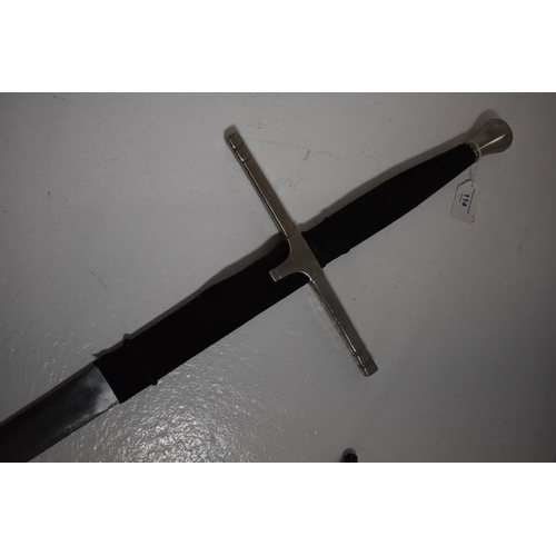 114 - Very large double handed steel sword. 137 cm long