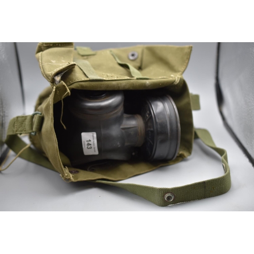 143 - Cold war period British military gas mask with a green canvas case