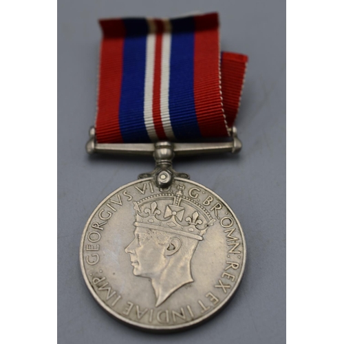 148 - WW2 British war medal. Full size with ribbon