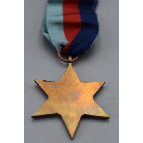 149 - WW2 British 1939-1945 star medal. Full size with ribbon